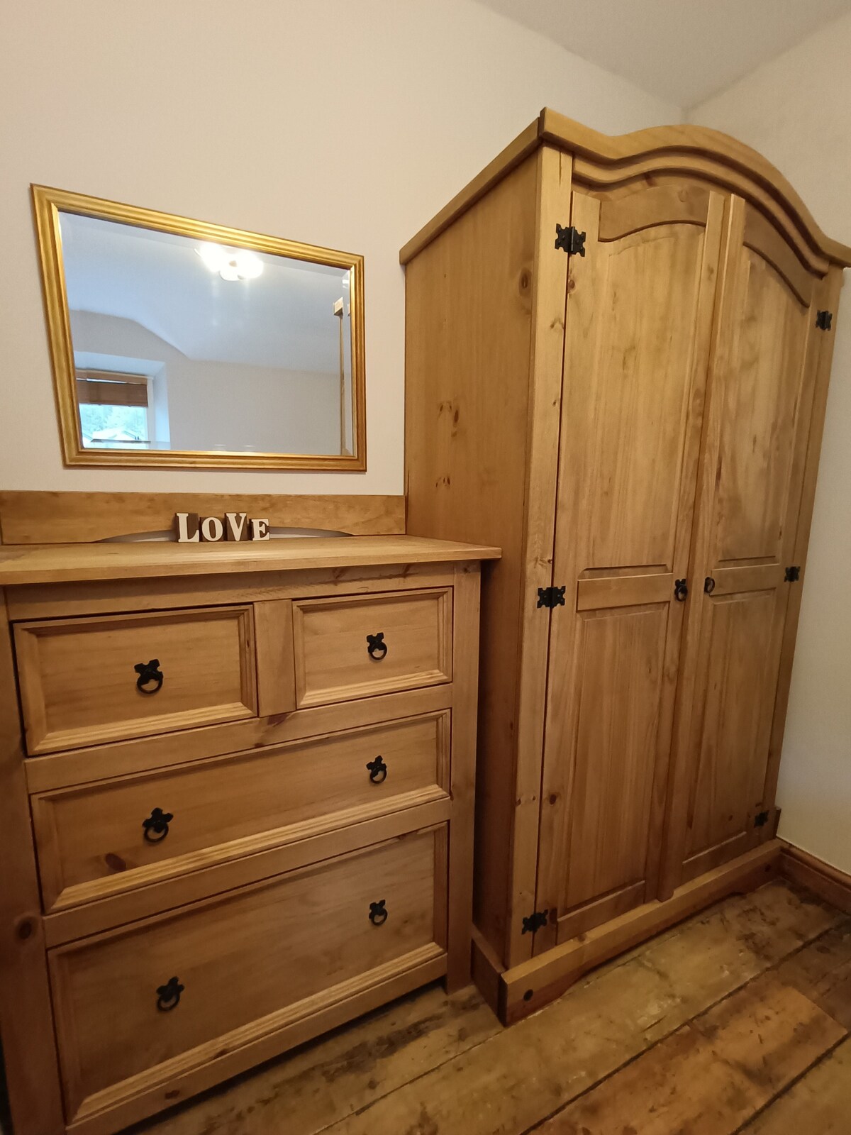 Wardrobe and dresser in master bedroom