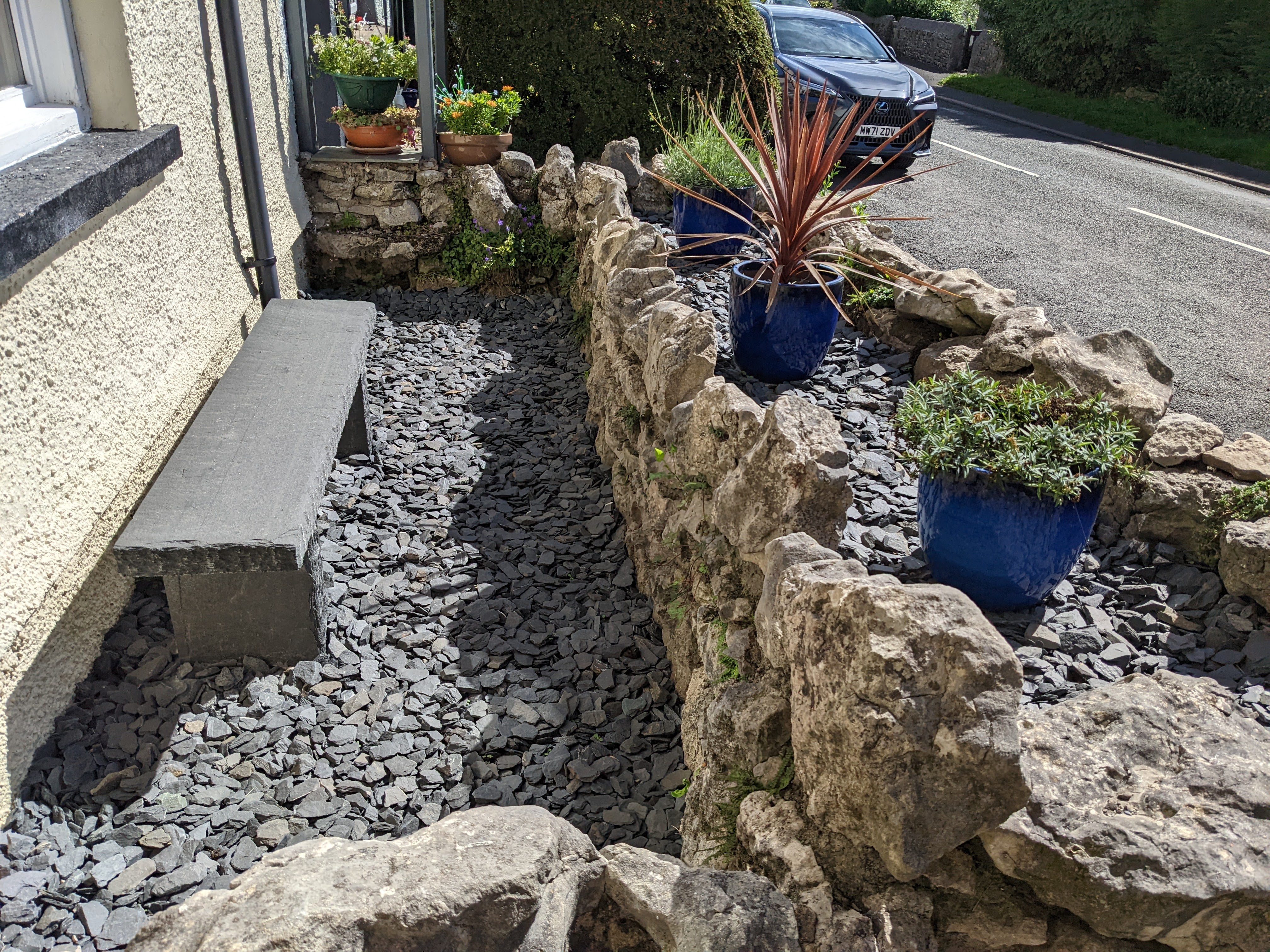 Slate bench to have your morning coffee whilst you watch the world go by