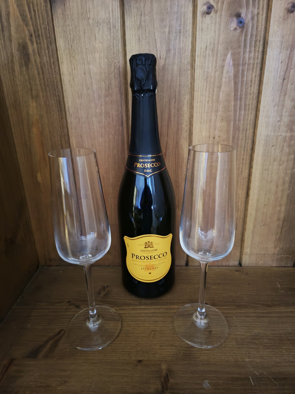 Celebrate with a bottle of bubbly in lead crystal glasses